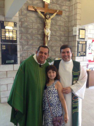 Fr. Bene, a young parishioner (Raquel) from Our Lady of the Rosary, and Fr. Will