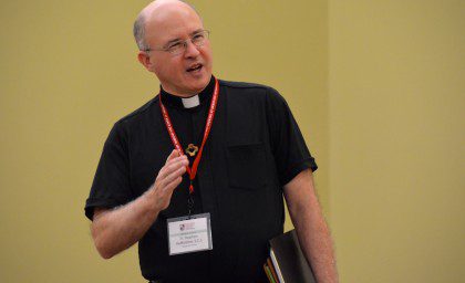 Fr. Stephen Hufstetter talks to the group, noting the North American Continental Conference and the Provincial Chapter cited youth outreach as a priority.