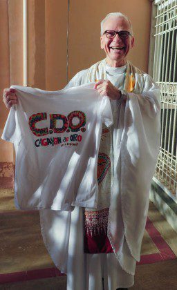 Fr. John shows off a gift from the Philippine SCJs and students