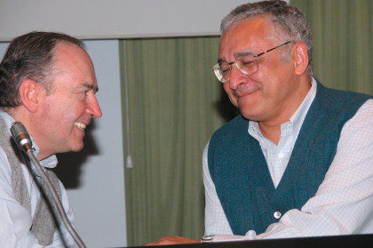 Fr. Ornelas (right) receives congratulations on his election as superior general in 2003 from out-going general, Fr. Virginio Bressanelli