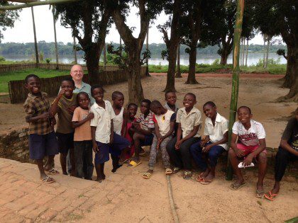 Fr. Steve with children in Congo.