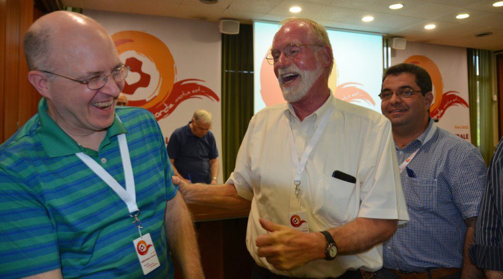 Fr. Ed shares a laugh with Fr. Steve soon after Fr. Steve's election to the General Council.
