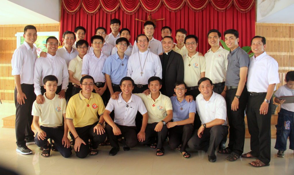 Fr. Francis, the bishop and members of the community